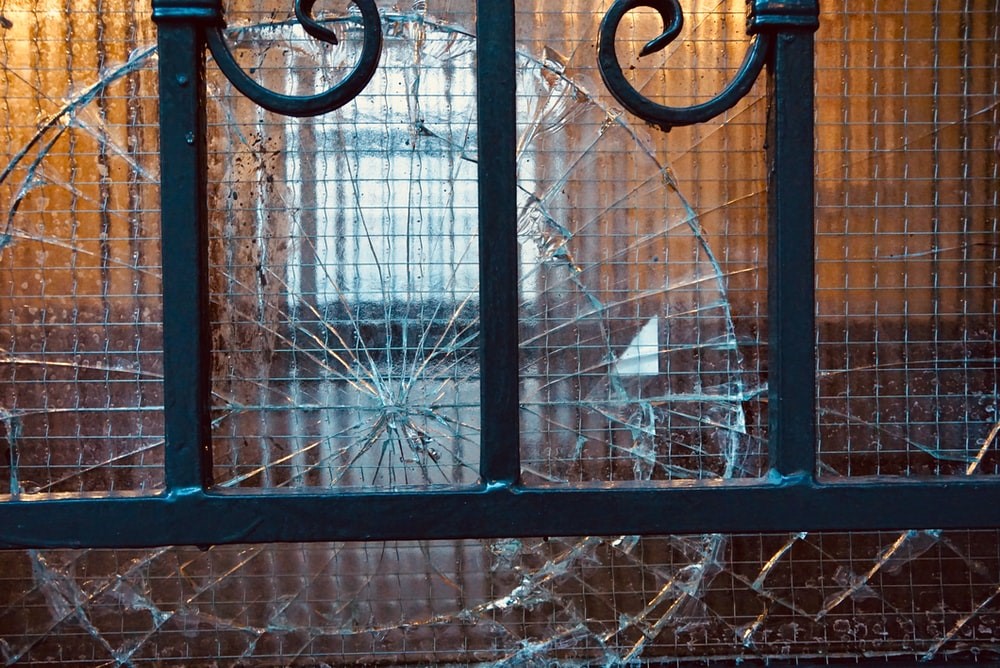 broken grilled glass window